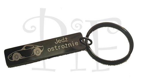 brelok czarny jedz ostroznie.png